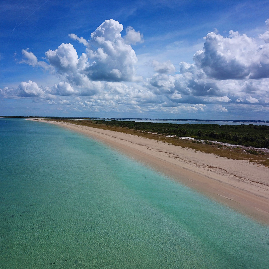 Aerial photo of a beach on the gulf coast on a cloudy day